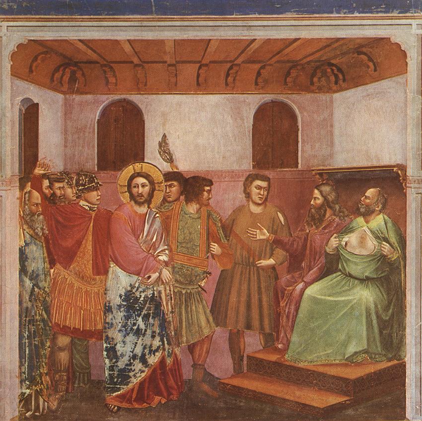 Giotto's fresco of Christ before Caiaphas: the high priest tears his robes on his judgment seat as Jesus stands bound before him in the torch-lit chamber.