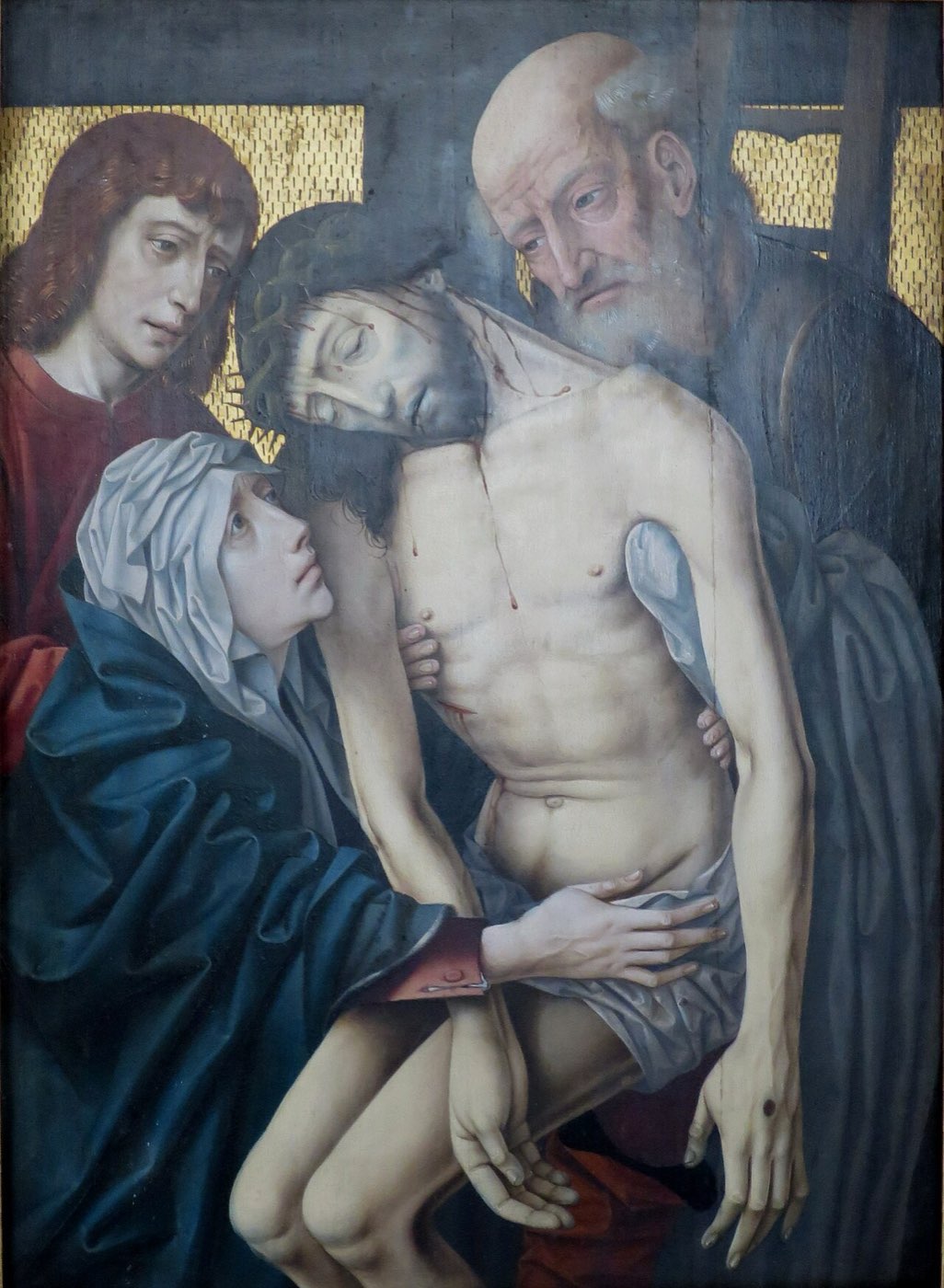 A Netherlandish Descent from the Cross: the aged Joseph of Arimathea supports the body of Christ as Mary and John grieve beside the ladder against gold-patterned ground.