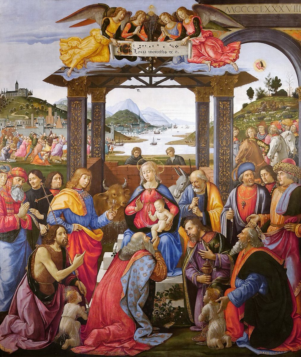 Ghirlandaio's Adoration of the Magi: richly robed kings and their retinues gather around Mary and the child beneath a stable's columned roof, with a harbor city and hills behind.
