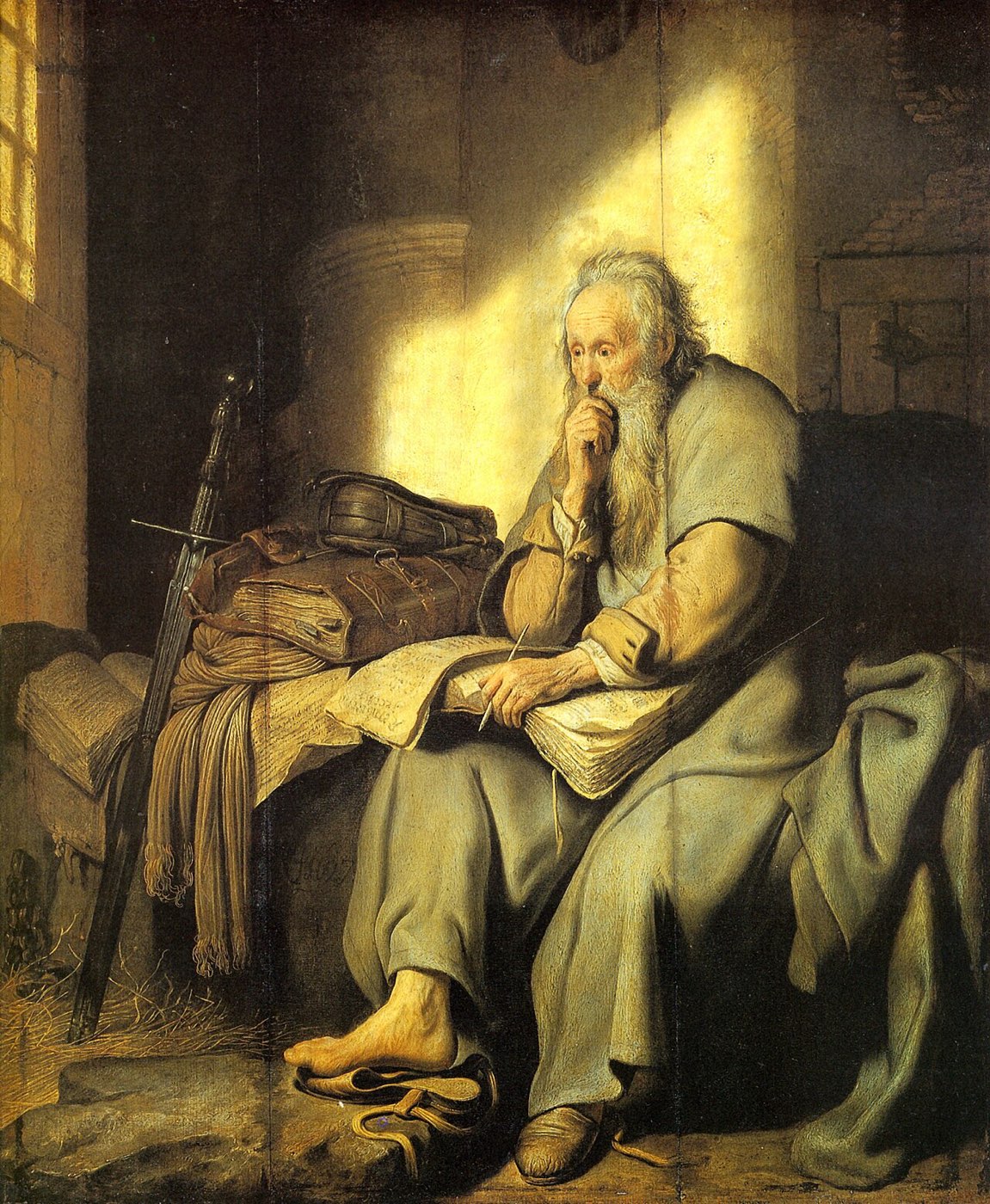 Rembrandt's Saint Paul in prison: the apostle sits on his bed with sword and scattered manuscripts, pen in hand, gazing upward in thought through the cell's light.