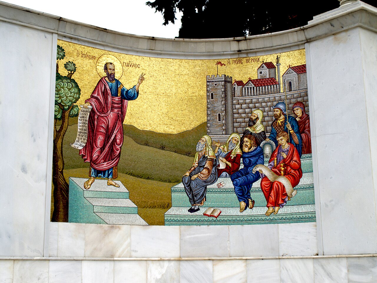 A golden mosaic at the St. Paul monument in Veria: Paul preaches from a stepped platform to seated listeners, with the walled city of Berea behind them.